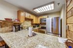 Upgraded appliances and sturdy granite kitchen